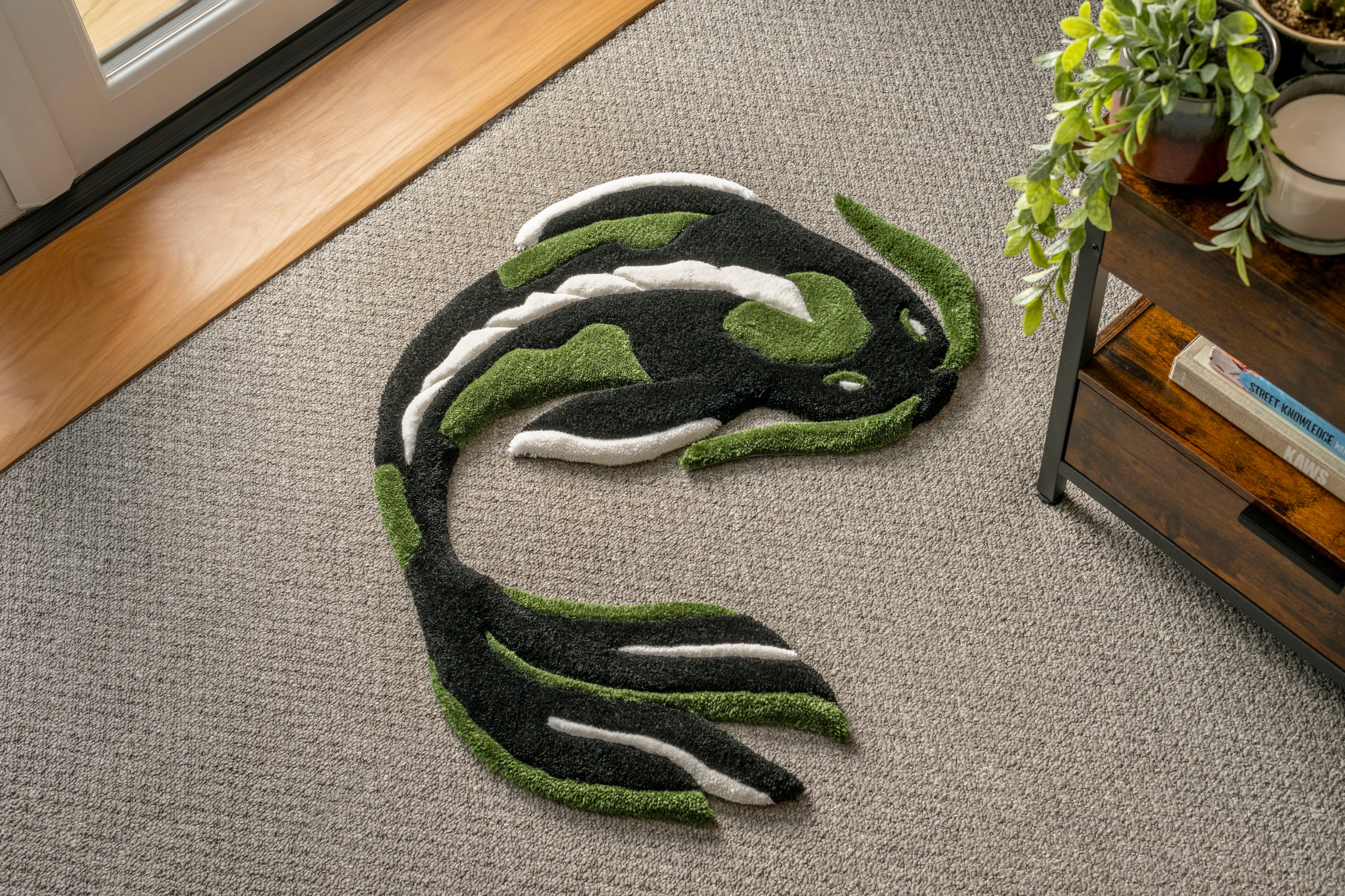 Handmade dark green koi fish rug featuring flowing black, green and white details inspired by Japanese koi fish artwork.