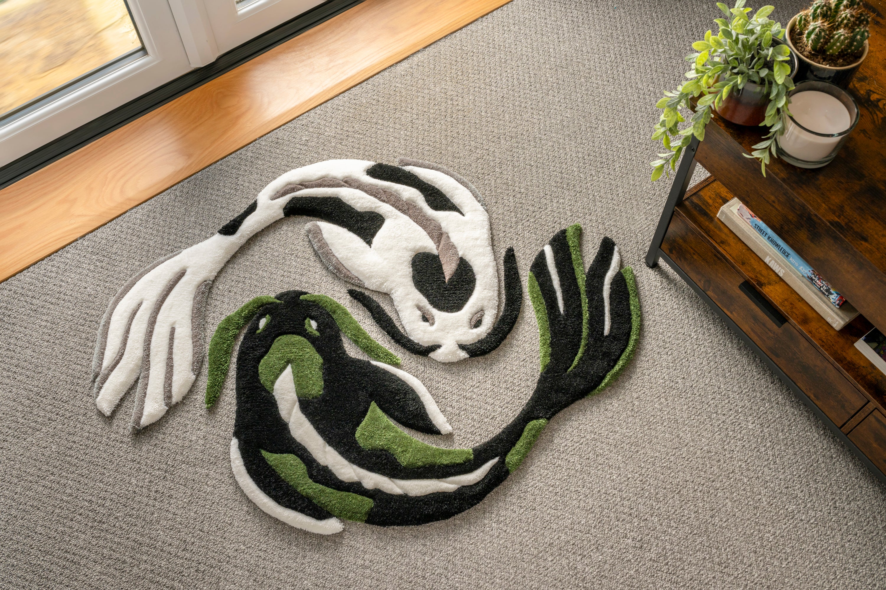 Dark green and white koi fish rugs arranged in a yin yang formation, creating a balanced Japanese-inspired statement piece.