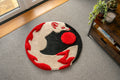 Handmade kitsune moon rug featuring a white fox silhouette, red moon and flowing tails in a Japanese-inspired circular design.