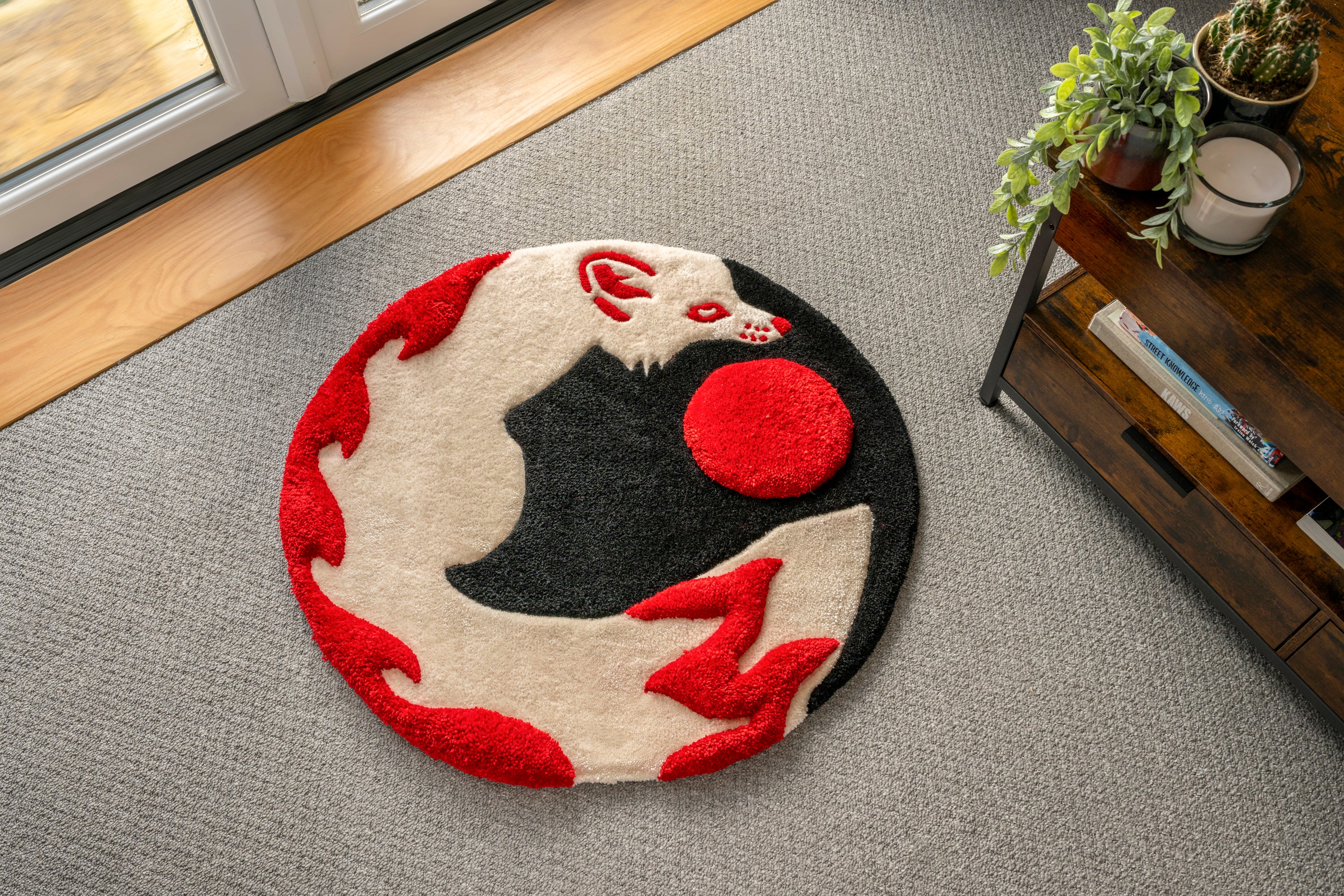Handmade kitsune moon rug featuring a white fox silhouette, red moon and flowing tails in a Japanese-inspired circular design.