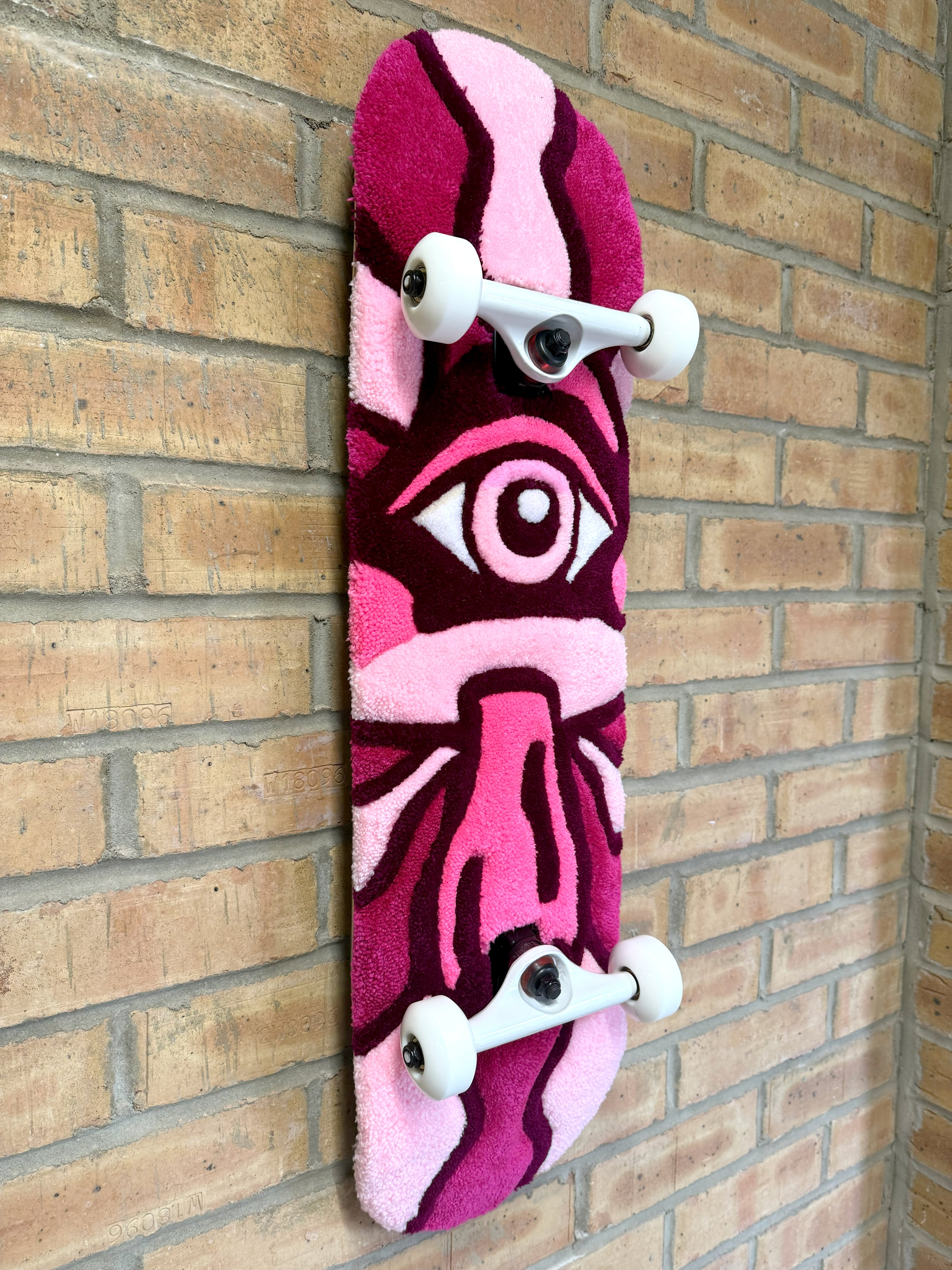 Side profile of the Psychedelic Mushroom Rugboard mounted on a skateboard deck showing depth and texture.